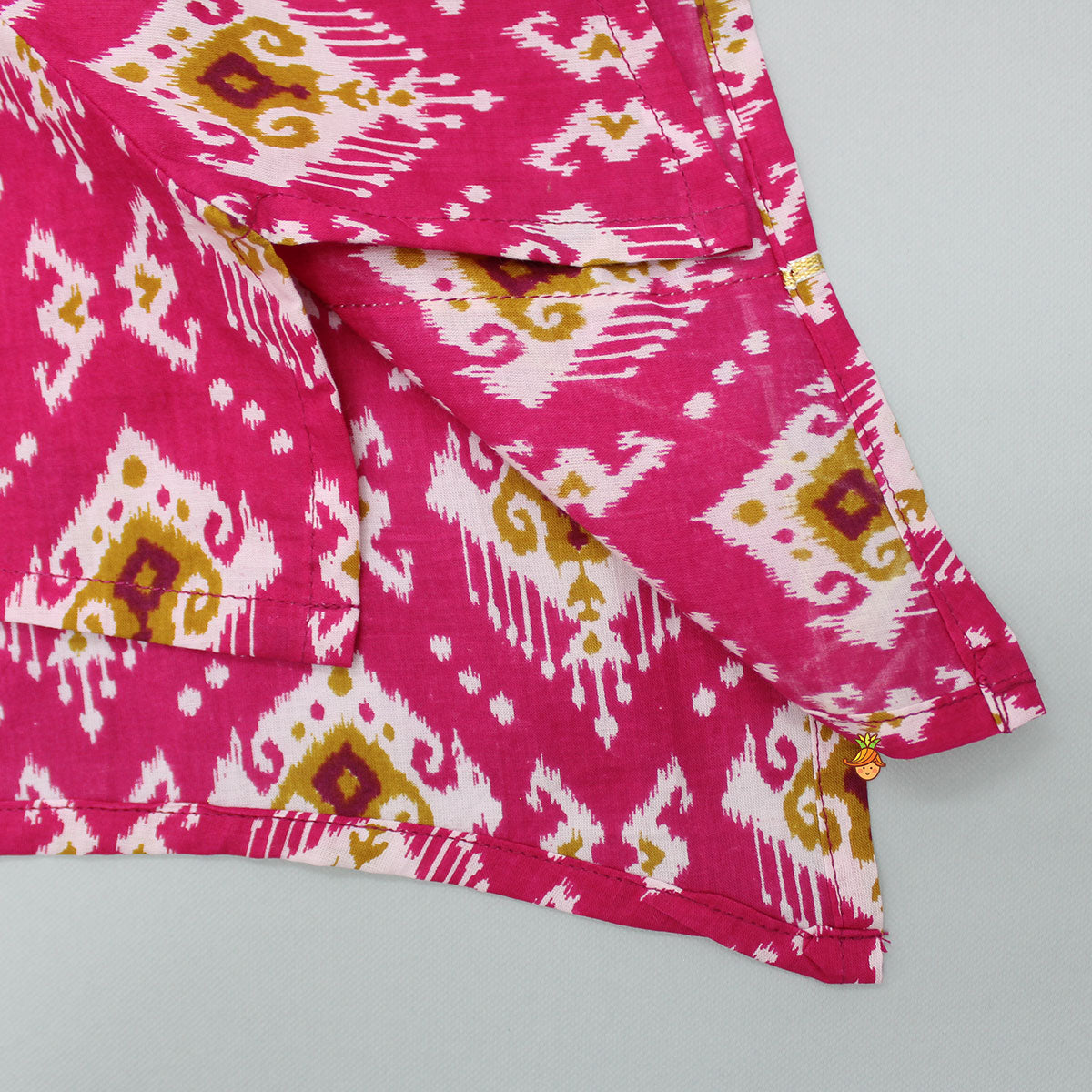 Stylish Ikat Printed Hot Pink Kurti With White Tulip Dhoti