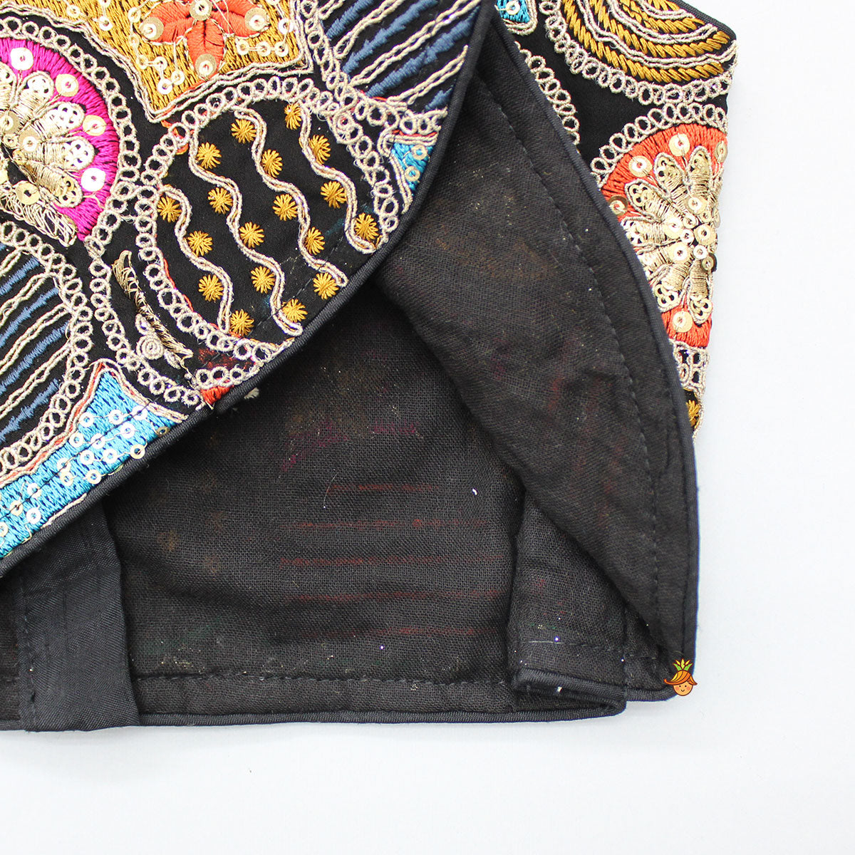 Heavy Embroidered Loop Detail Black Top And Colourful Fringes Tassels Enhanced Lehenga