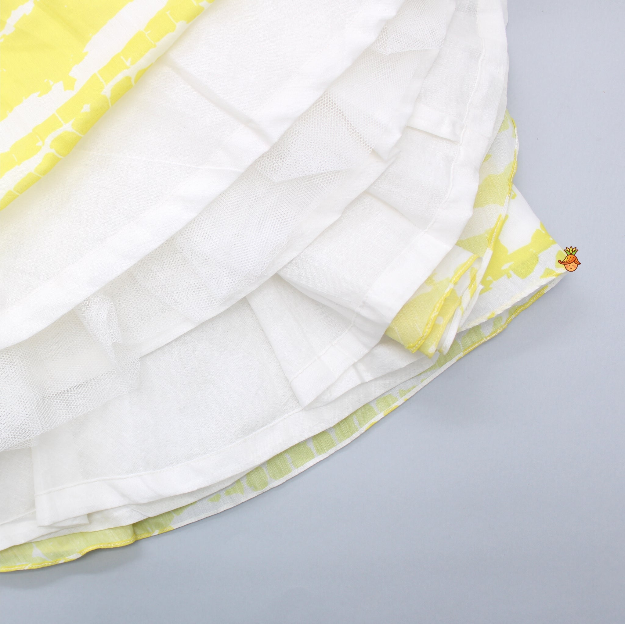 Beaded Yellow Top And Shibori Printed Lehenga With Ruffle Dupatta