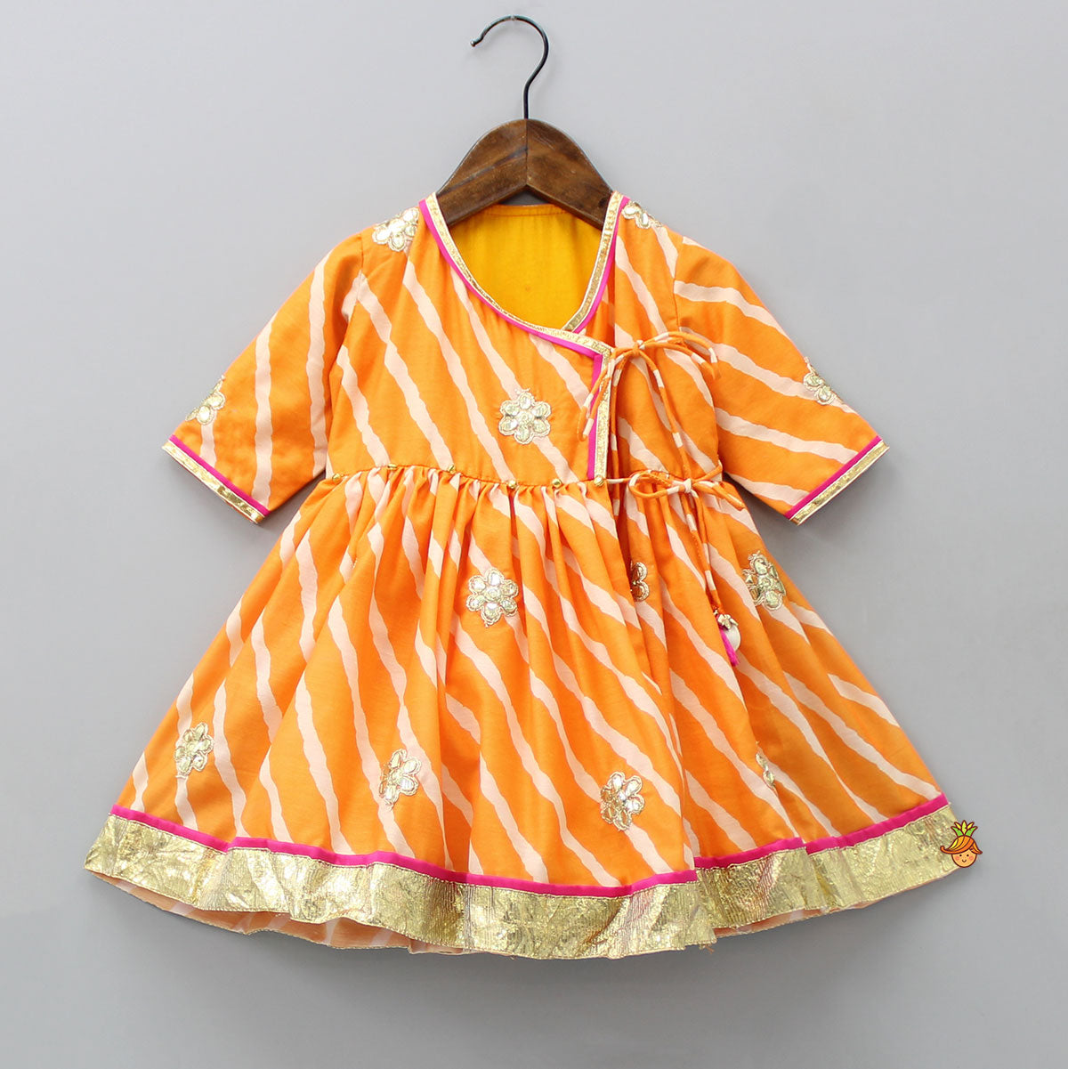 Leheriya Printed Orange Angrakha Kurti With Matching Bowie Hair Clip