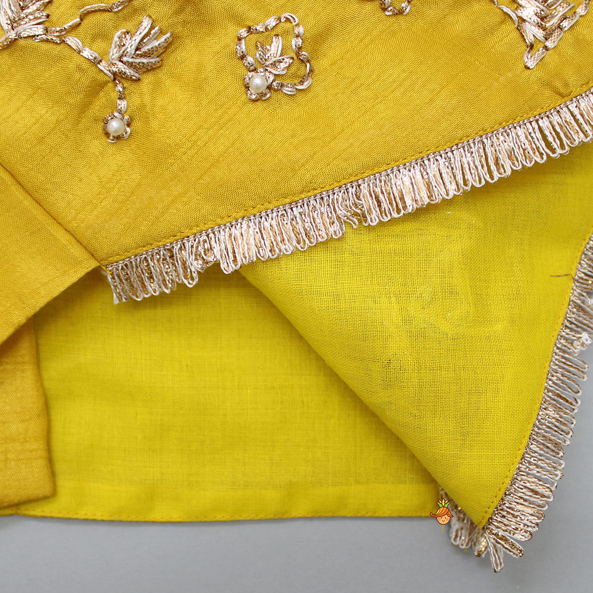 Beautiful Halter Neck Embroidered Mustard Top And Lehenga With Net Dupatta